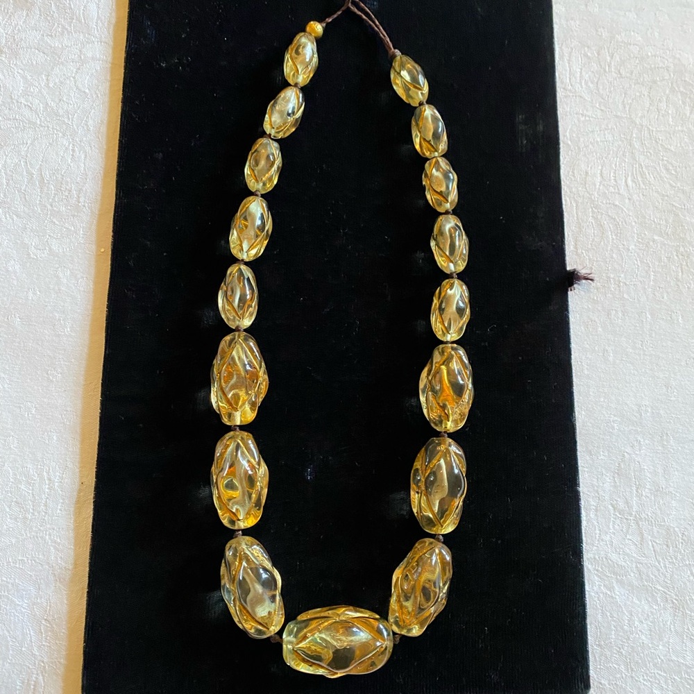 Gild bead necklace by Donatella Pellini.